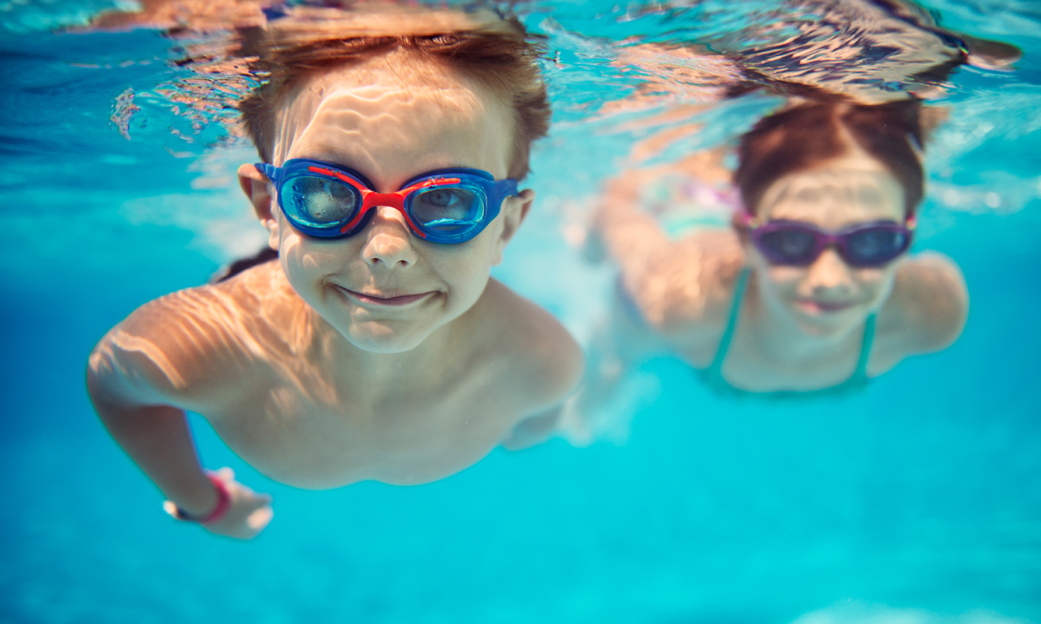 Children swimming underwater