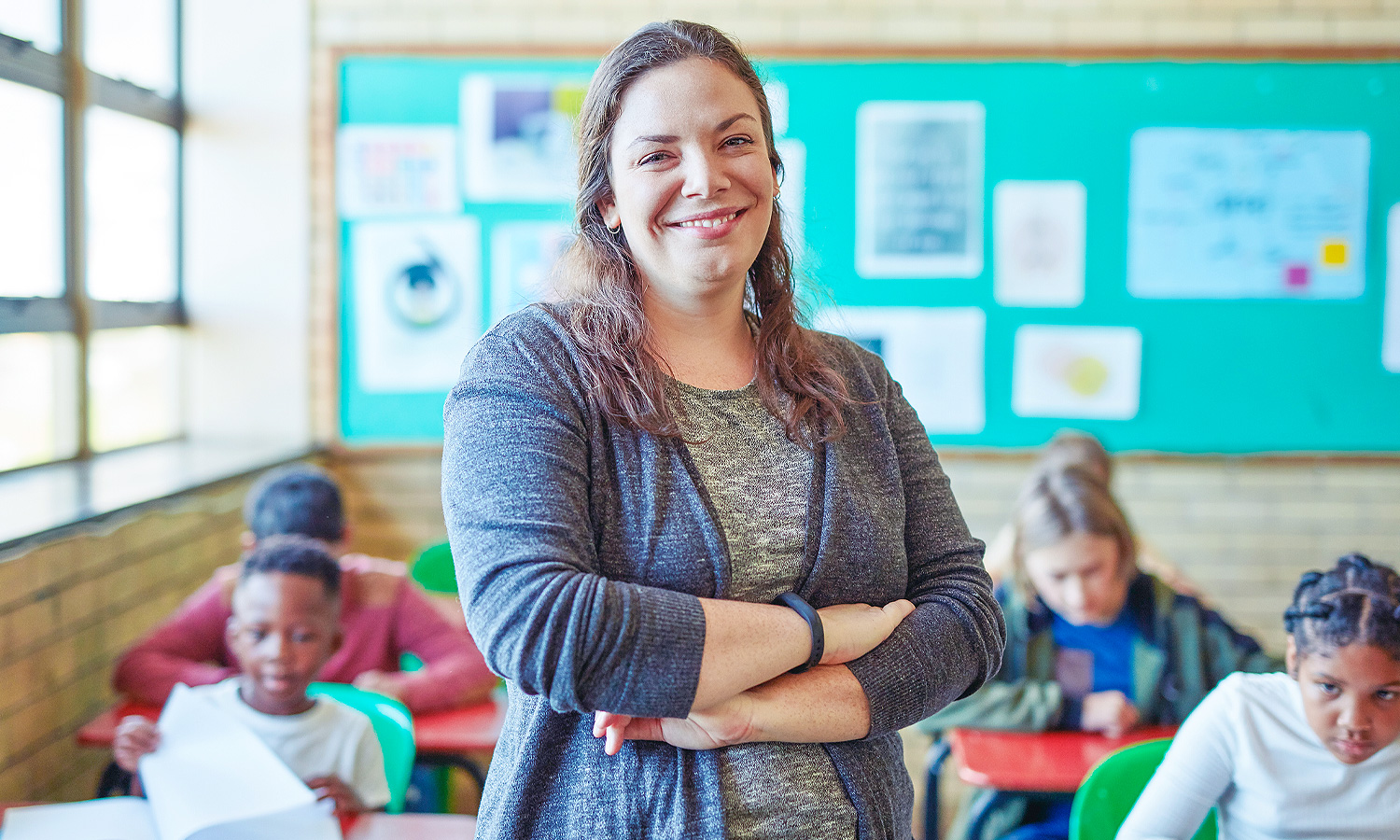 Teacher smiling in a classroom