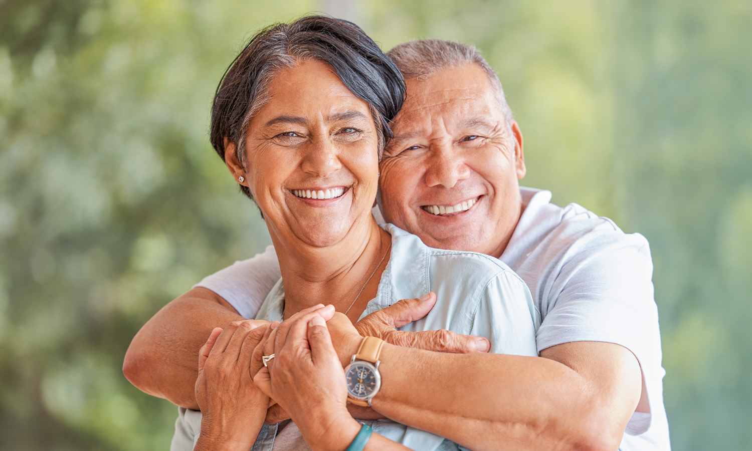 man giving woman a hug